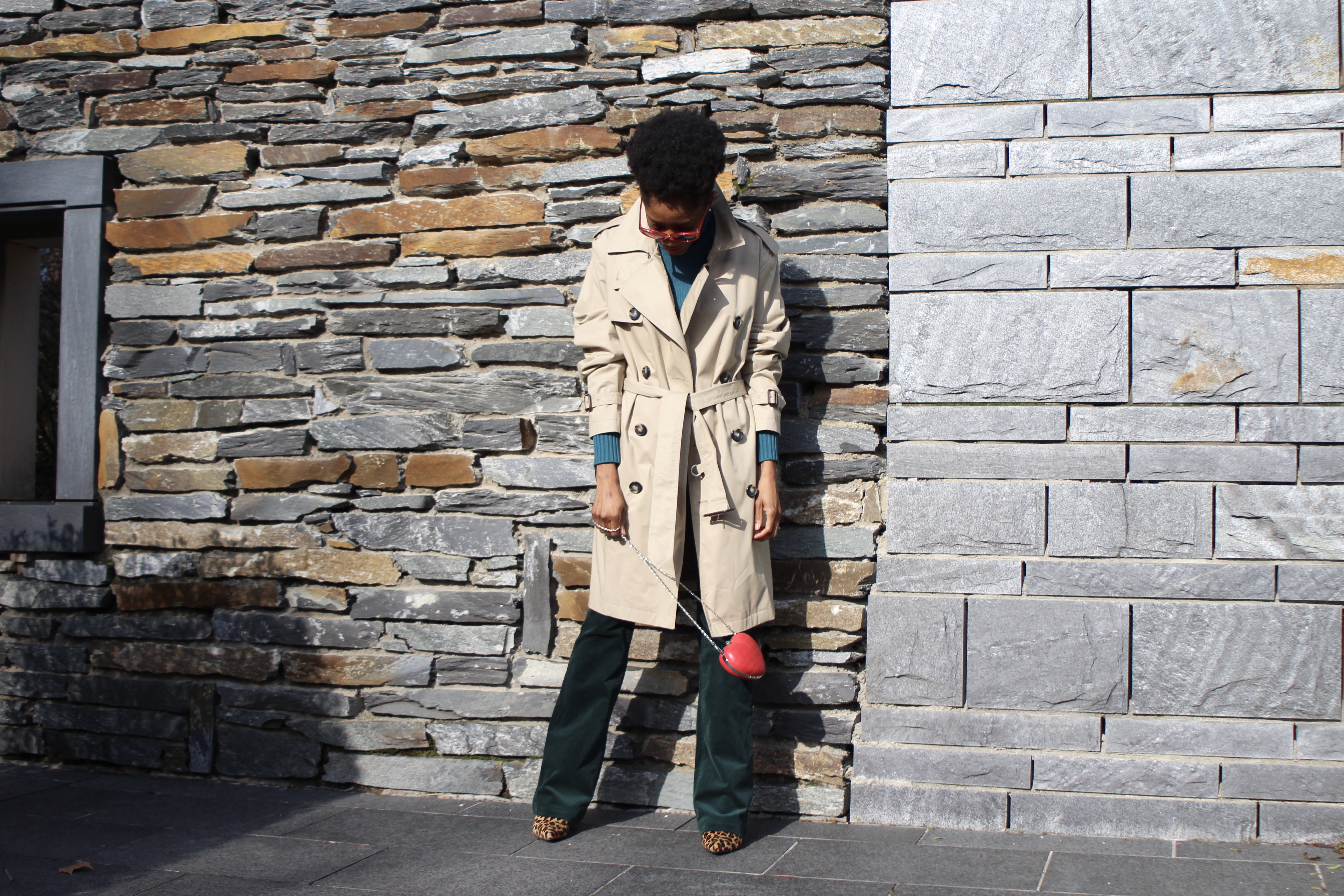 Oversized trench coat with turtle neck and corduroy trousers.