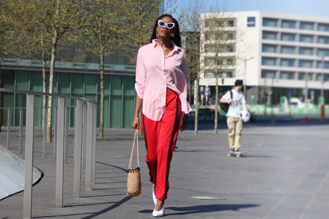 Track Pants Outfit In Red Tracks Pink Stripes And Bold Accessories