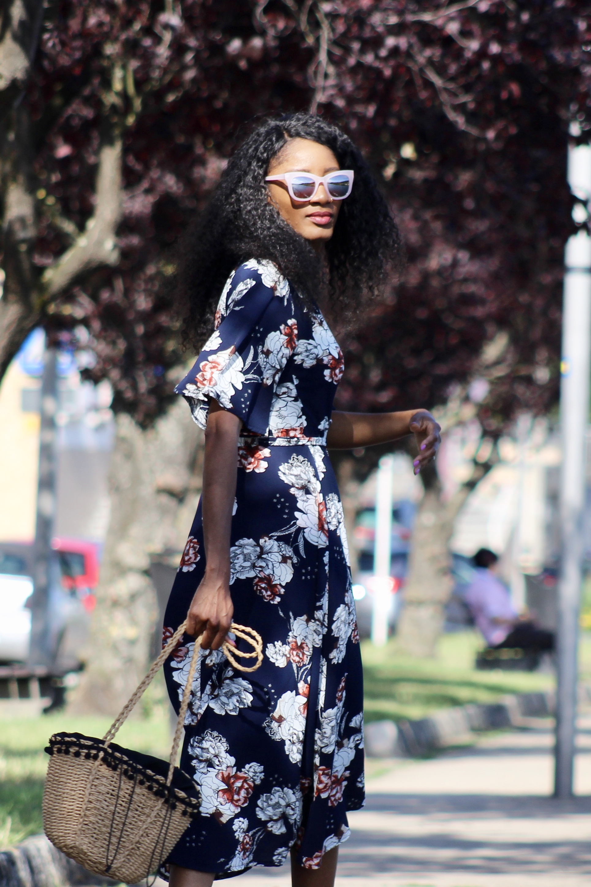 summer outfit floral wrap dress statement sunglasses