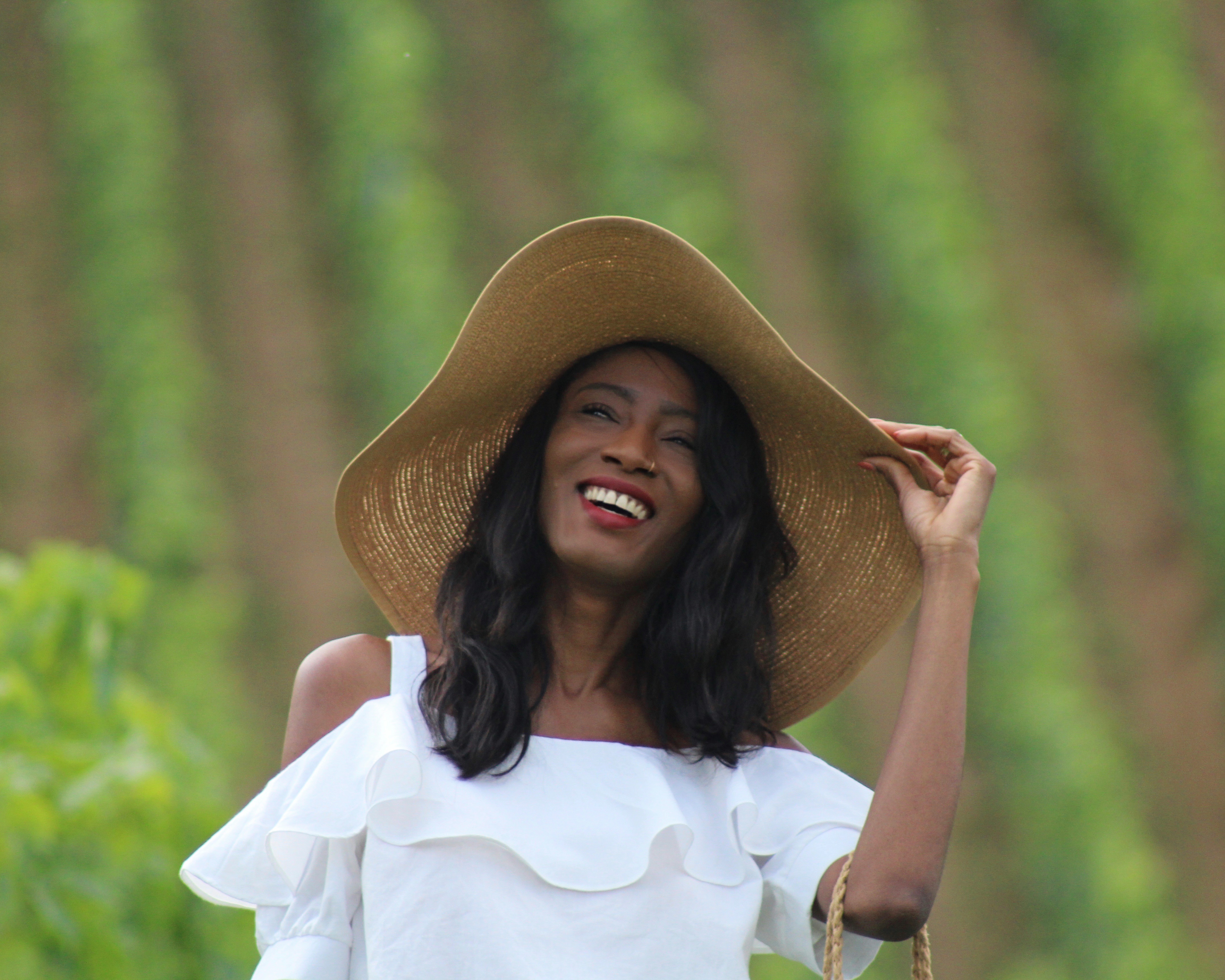 white summer dress floppy hat sandals