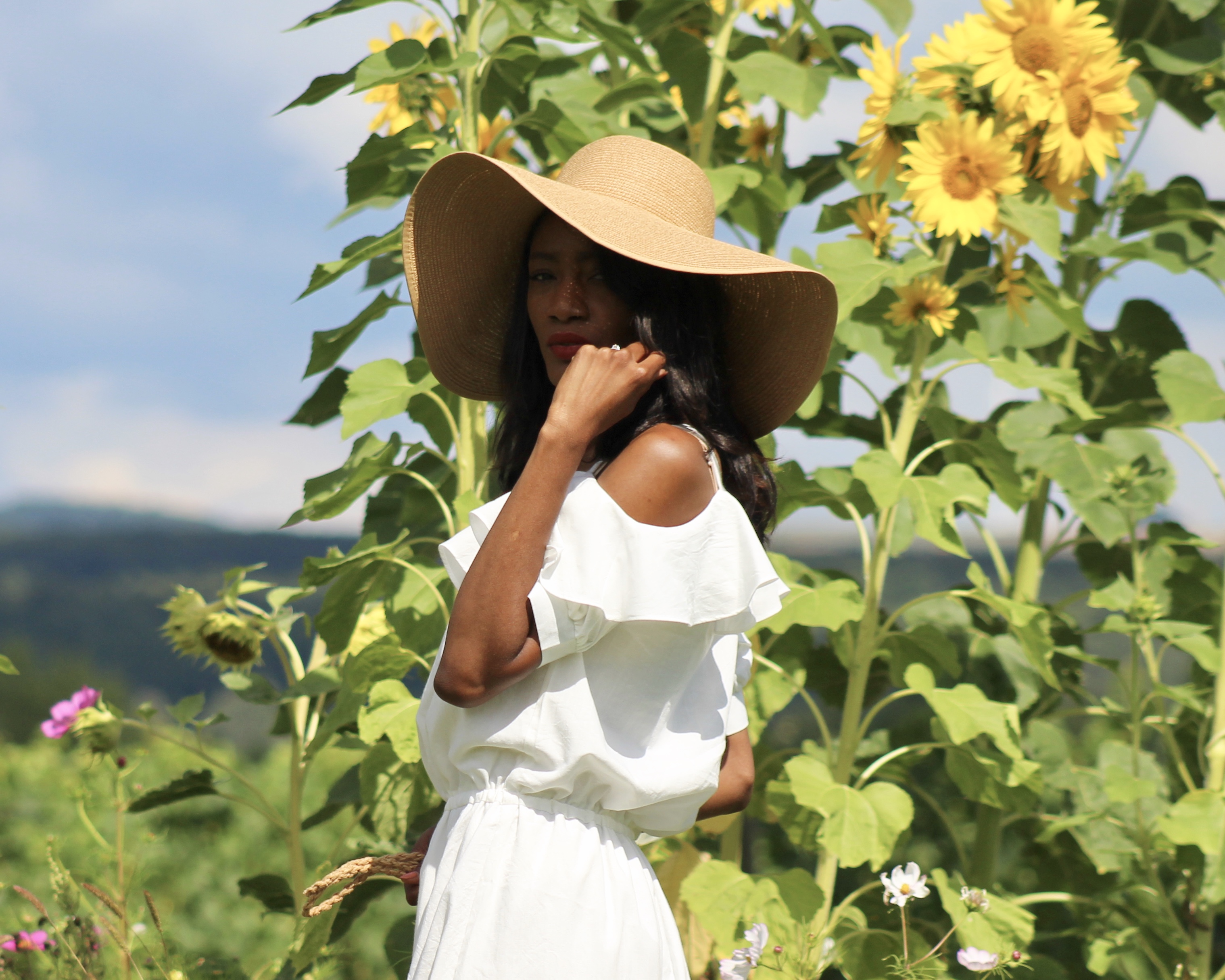 white summer dress floppy hat sandals