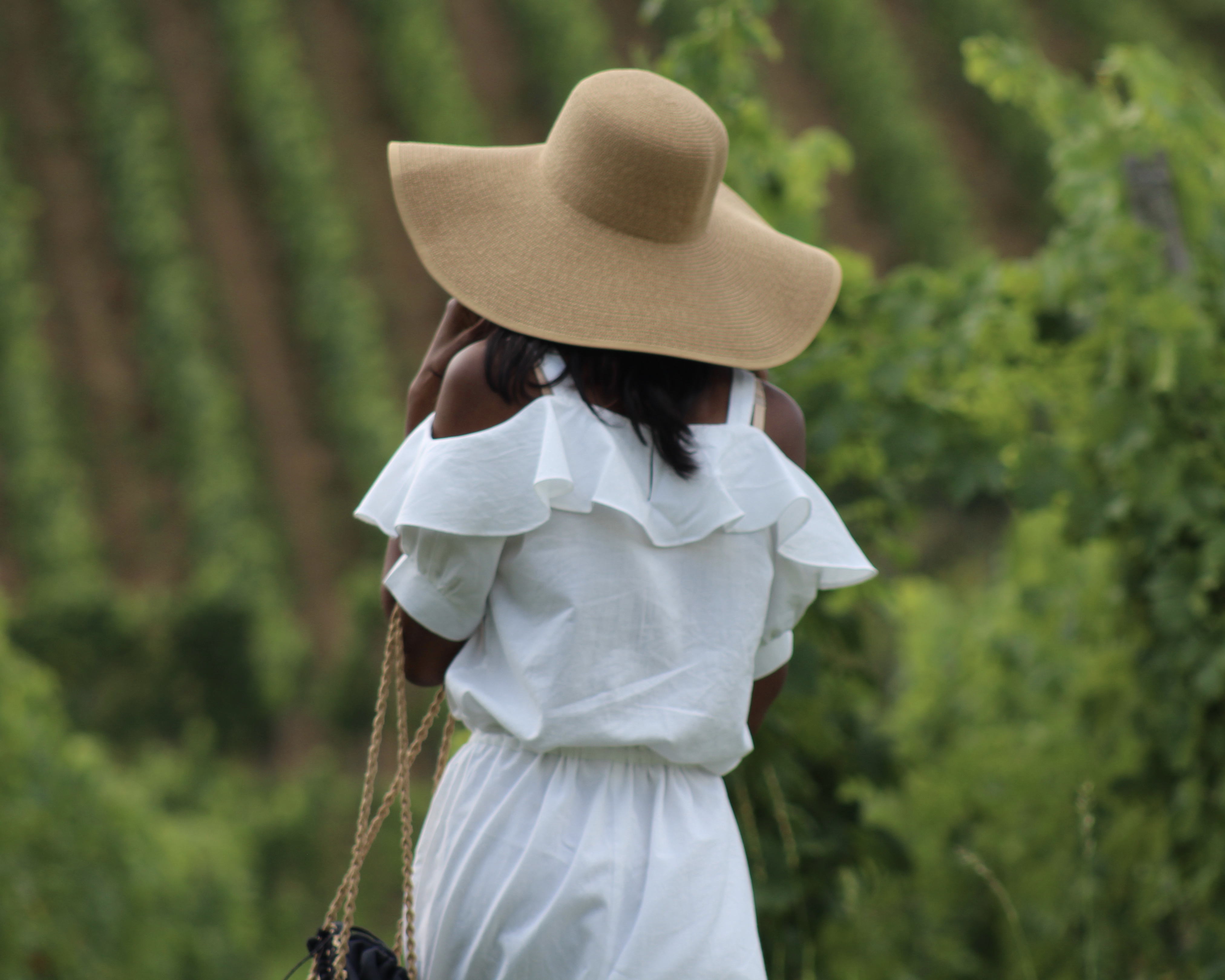 white summer dress floppy hat sandals